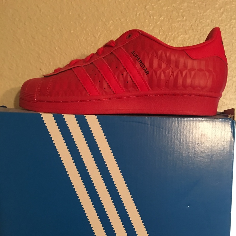 Red adidas superstars